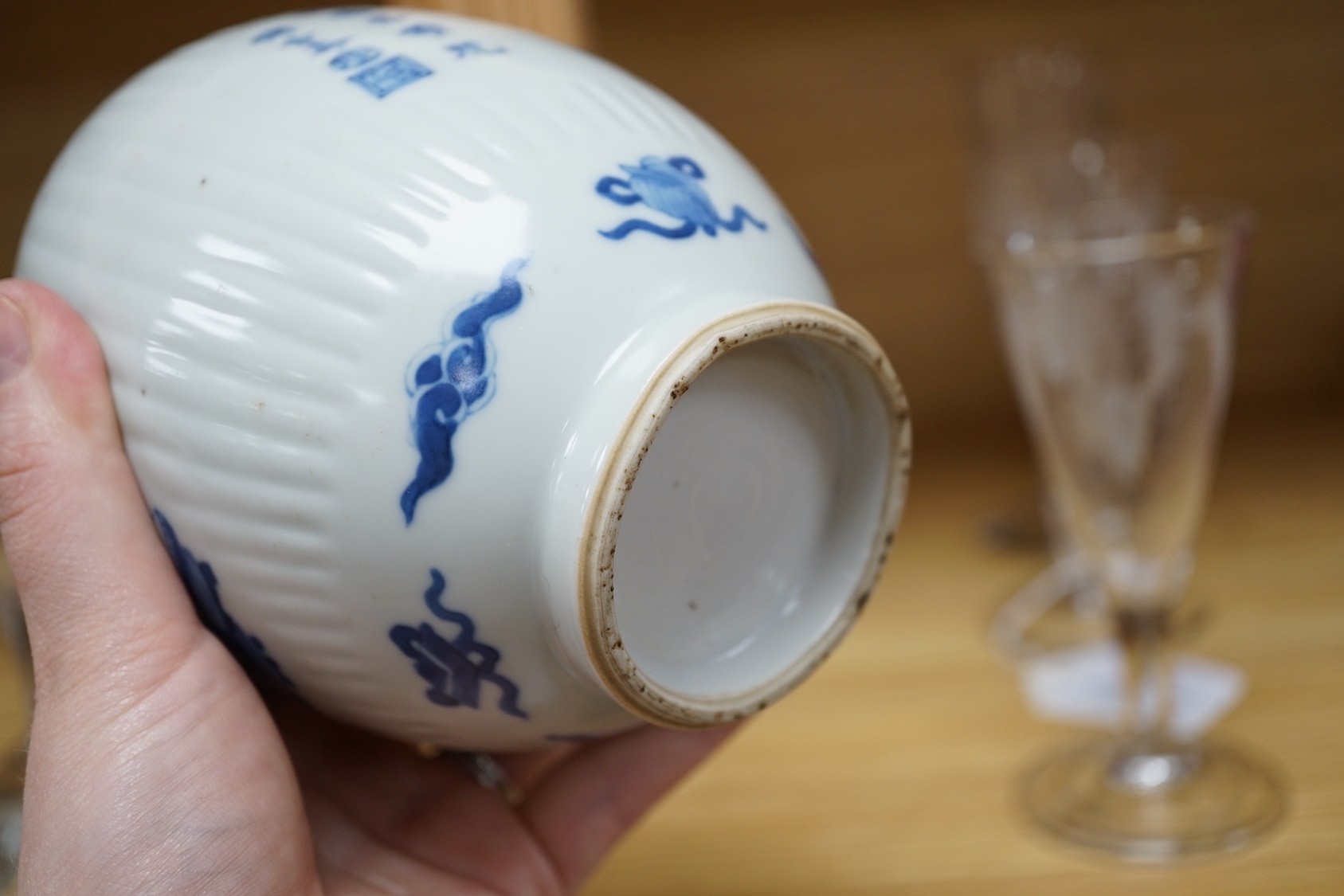 A Chinese blue and white fluted ovoid jar 16cm